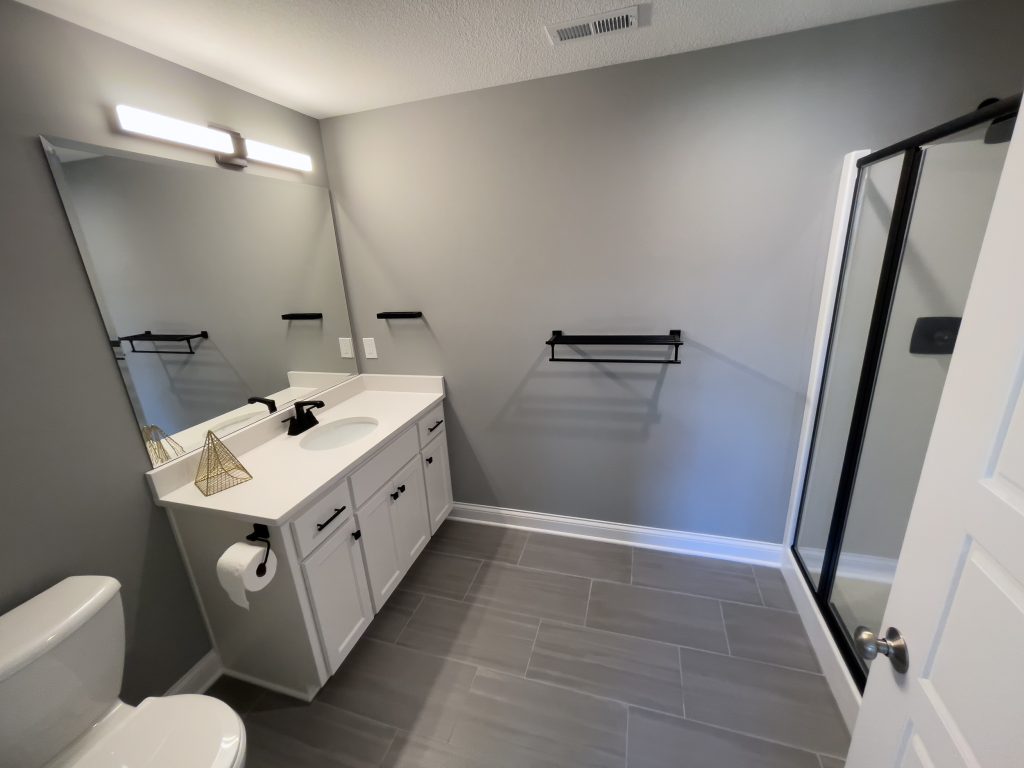 Kansas City basement remodel guest bathroom vanity
