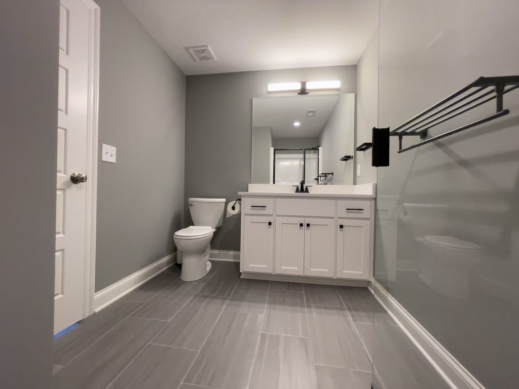 Kansas City basement remodel guest bathroom vanity
