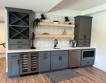 Kansas City basement remodel built in shelving wetbar