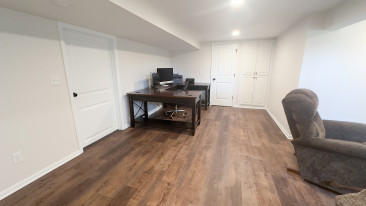 Basement finish linear fireplace home office kansas city remodeling cabinets