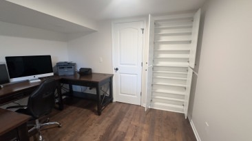 Basement finish linear fireplace home office kansas city remodeling built-in cabinets