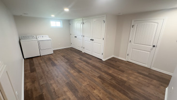Basement finish linear fireplace home office kansas city remodeling cabinets laundry