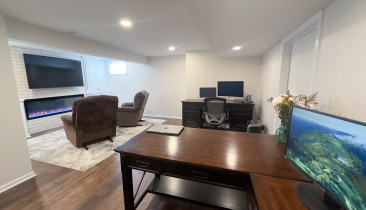 Basement finish linear fireplace home office kansas city remodeling cabinets